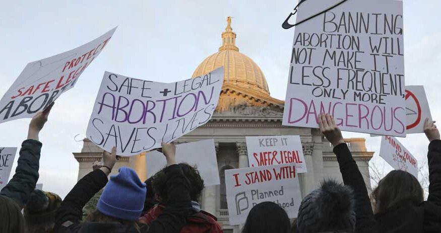 Demonstrators protest outside the Wisconsin Capitol on May 3, 2022, in Madison. (AP file photo: Wisconsin State Journal)