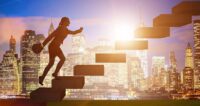 Businesswoman in career growth concept with stairs