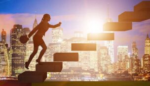 Businesswoman in career growth concept with stairs