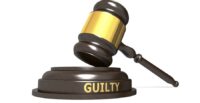 Wooden judge gavel with guilty word, 3d rendering