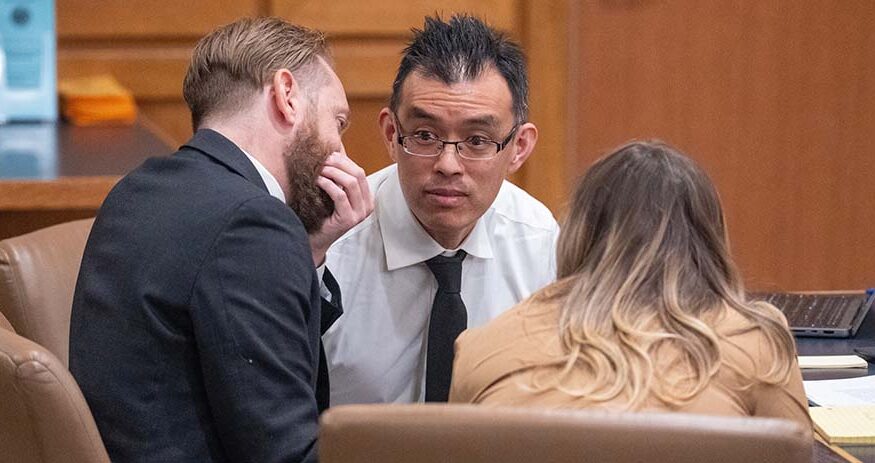 Wayne Hsiung, center, appears in Dane County Court