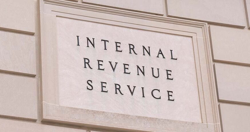 A sign on the outside of the IRS building in Washington, D.C., reading "INTERNAL REVENUE SERVICE"